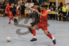 Lotto - Hallen - Bayerncup -  Saison 2022/2023 - FC Fatih Ingolstadt - SV Manching - Halbfinale -  Ramazan Kurnaz rot Fatih - Kristof Kuchlbauer schwarz Manching - Foto: Meyer Jürgen