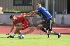 Testspiel - Bezirksliga - Saison 2025/26 - FC Fatih Ingolstadt - TSV Burgheim - Aaron Toski rot Fatih - Florin Horoba blau Burgheim - Foto: Meyer Jürgen