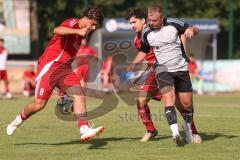Testspiel - Bezirksliga - Saison 2025/26 - TSV Ober./Unterhaunstadt - Türkisch Ingolstadt  - Baha Asici rot Türkisch  - Florian Diegel weiss Ober./Unterh.stadt - Daniel Drotleff rot #8 Türkisch - Foto: Meyer Jürgen