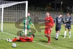 Bayernliga Süd - Saison 2022/2023 - FC Ingolstadt 04 -  VFB Hallbergmoos - Gashi Egson (Nr.9 - Fc Ingolstadt 04 II) mit einer Torchance - Carl Opitz schwarz Hallbergmoos - Dominic Dachs Torwart Hallbergmoos - Karaogul Ishak (Nr.10 - Fc Ingolstadt 04 II) -