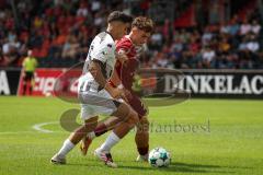 3. Liga - Saison 2026/27 - FC Ingolstadt 04 -  Großaspach - Emre Gül (Nr.5 - FCI) - Luca Molinari (Nr.21 - Großaspach) - Foto: Meyer Jürgen