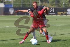 * Testspiel - Saison 2025/26 - FC Ingolstadt 04 - FSV Zwickau - Yann Sturm (Nr.7 - FC Ingolstadt 04) - Oliver Fobassam (Nr.22 - FSV Zwickau) - Foto: Meyer Jürgen