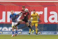 3. Liga - Hansa Rostock - FC Ingolstadt 04 - Tobias Schröck (21, FCI) rettet den Ball, Torwart Fabijan Buntic (24, FCI) Simon Rhein (5 Rostock)