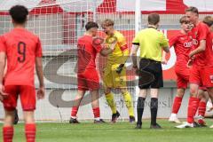 Im Bild: Bleron Pirku (#24 FCI B-Junioren) und Julian Bock (TW #22 FCI B-Junioren) schreien ihre Freude nach dem Schlusspfiff heraus

Fussball - B-Junioren - Relegation 2021  - FC Ingolstadt 04 - SSV Jahn Regensburg -  Foto: Ralf Lüger/rsp-sport.de