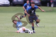 Kreisliga - Saison 2023/2024 - SV Menning  - FC Sandersdorf - Simon Wolfsfellner blau Menning - Manuel Recum weiss Sandersdorf - Foto: Meyer Jürgen