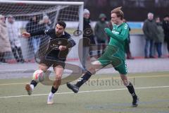 Freundschaftsspiel - FC Fatih Ingolstadt - TV Aiglsbach - Akif Abasikeles schwarz FC Fatih - Paul Helten grün Aiglsbach - Foto: Meyer Jürgen