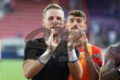 3.Liga - Saison 2022/2023 - VFL Osnabrück - FC Ingolstadt 04 - Das Spiel ist aus - Jubel - Die Mannschaft bedankt sich bei den Fans - Torwart Marius Funk (Nr.1 - FCI) - Foto: Meyer Jürgen