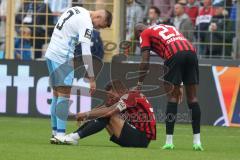 3.Liga - Saison 2022/2023 - TSV 1860 München - FC Ingolstadt 04 - Pascal Testroet (Nr.37 - FCI) verletzt am Boden - Foto: Meyer Jürgen