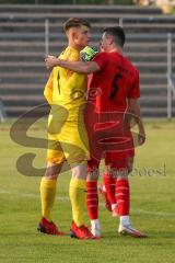 Bayernliga Süd - Saison 2021/2022 - FC Ingolstadt 04 II - Schwaben Augsburg - Markus Ponath Torwart (#1 FCI) pariert einen Elfmeter von Marco Luburic Augsburg - Abklatschen mit seinem Mitspieler Cavadias Fabian (#5 FCI) - Foto: Meyer Jürgen