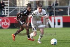 3. Liga - Saison 2023/24 - Testspiel - 1. FC Nürnberg - FC Ingolstadt 04 -  - Hungbo Joseph (#23 Nürnberg) - Felix Keidel (Nr.43 - FCI) - Foto: Meyer Jürgen