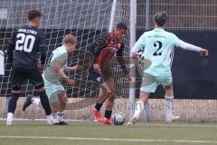 Bayernliga Nord - Saison 2024/25 - FC Ingolstadt 04 II - DJK Ammerthal - Micah Ham (Nr.25 - FCI U21) - Michael Janner links blau Ammerthal - Vitus Zimmermann blau rechts Ammerthal - Foto: Meyer Jürgen
