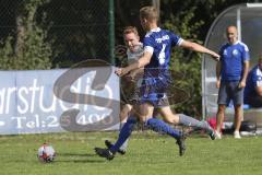Kreisliga - Saison 2023/2024 - TSV Ober/Unterh.stadt- TSV Mümchsmünster - Simon Bellinghausen blau Oberh.stadt - Sebastian Hauber grau M. Münster - Foto: Meyer Jürgen