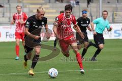 3.Liga - Saison 2022/2023 - SC Freiburg II - FC Ingolstadt 04 - Merlin Röhl (Nr.28 - SC Freiburg II) - Tobias Bech (Nr.11 - FCI) -  - Foto: Meyer Jürgen