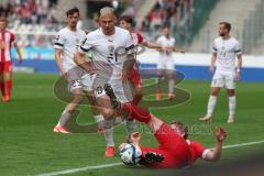 3. Liga - Saison 2023/24 - Rot-Weiss Essen - FC Ingolstadt 04 -  - Maximilian Dittgen (Nr.10 - FCI) - Felix Götze (#24 Essen)ä - Foto: Meyer Jürgen