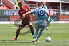 3.Liga - Saison 2022/2023 - FC Ingolstadt 04 -  SV Wehen Wiesbaden - Marcel Costly (Nr.22 - FCI) - Sebastian Mrowca (Nr.10 - SV Wehen Wiesbaden) - Foto: Meyer Jürgen