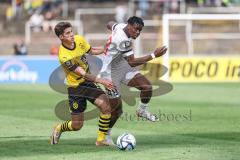 3. Liga; Borussia Dortmund II - FC Ingolstadt 04; Bryang Kayo (48, FCI) Tattermusch Ted (19 BVB2) Zweikampf Kampf um den Ball