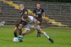 Bayernliga Süd - Saison 2021/2022 - FC Ingolstadt 04 II - SV Donaustauf - Riedl Fabio (#18 FCI) - Fabian Vogl weiss #3 Donaustauf - Foto: Meyer Jürgen