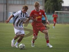 Bayernliga Nord - Saison 2026/27 - FC Ingolstadt 04 II - Jahn Regensburg II - Manuel Distl (Nr.9 - FCI II) - Raphael Steudtner rot Regensburg - Foto: Meyer Jürgen