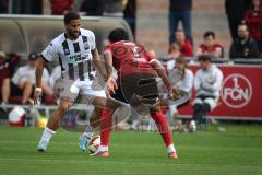 Saison 2026/27 - Freundschaftsspiel - 1. FC Nürnberg - FC Ingolstadt 04 - Keanan Bennetts (Nr.18 - FCI) - Rayan Ghrieb (Nr.7 - FCN) - Foto: Meyer Jürgen