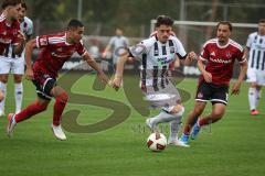 Saison 2026/27 - Freundschaftsspiel - 1. FC Nürnberg - FC Ingolstadt 04 - Dennis Kaygin (Nr.10 - FCI) - Ioannis Masouras (Nr.21 - FCN) links - Foto: Meyer Jürgen
