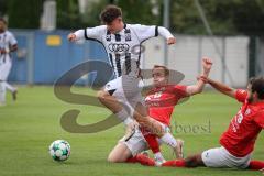 Bayernliga Nord - Saison 2026/27 - FC Ingolstadt 04 II - ASV Cham - Timo Hengmith (Nr.10 - FCI II) - Lukas Leutner rot Cham #15 - Michael Lamecker rot Cham #5 - Foto: Meyer Jürgen