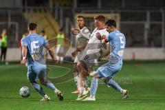 Toto-Pokal 2024; TürkGücü München - FC Ingolstadt 04; Zweikampf Kampf um den Ball Sebastian Grönning (11, FCI) Haimerl, Deniz (5TGM) Dzemailji, Faton (15 TGM)