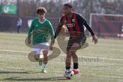 U19 - Nachwuchsliga -  - Saison 2024/25 - FC Ingolstadt 04 - 1. FC Schweinfurth - Neo Elijah Che rot FCI - Luke Barget grün Schweinfurth - Foto: Meyer Jürgen