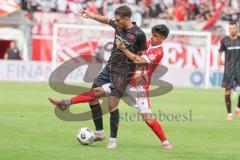 3. Liga - Saison 2025/26 - Energie Cottbus - FC Ingolstadt 04  - Max Besuschkow (Nr.17 - FC Ingolstadt 04) - Jannis Boziaris (Nr.19 - FC Energie Cottbus) - Foto: Meyer Jürgen
