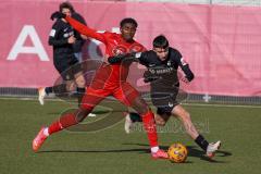 A - Junioren Bundesliga Süd/Südwest -  Saison 2021/2022 - FC Ingolstadt 04 - SC Freiburg - Udebuluzor Michael (#21 FCI) - Yilmaz Berkay #3 Freiburg -  - Foto: Meyer Jürgen