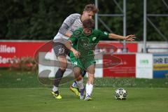 Landesliga - Saison 2026/27 - SV Manching - SC Cosmos Aystetten - Röber Jannik grün Manching - Schäfer Edward weiss Aystetten - Foto: Meyer Jürgen