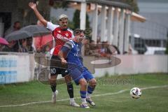 Kreisliga - Saison 2026/27- Türkisch SV Ingolstadt - SV Hundszell - Maximilan Blattner blau Hundszell - Umut Yürükal rot Türkisch  - Foto: Meyer Jürgen