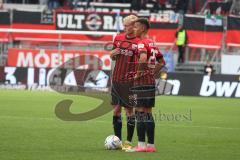 3.Liga - Saison 2022/2023 - FC Ingolstadt 04 -  SV Meppen - Tobias Bech (Nr.11 - FCI) - Marcel Costly (Nr.22 - FCI) beim Freistoss - Foto: Meyer Jürgen