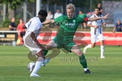 Freundschaftsspiel - Saison 2023/2024 - SV Manching - AL Jazira - Reiner Meisinger (Nr.8 - SV Manching) -  Mamadou Coulibari weiss AL Jazira - Foto: Meyer Jürgen