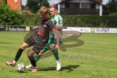 Landesliga - Saison 2025/26 - SV Manching - FC Sonthofen - Maximilian Eberwein (Nr.4 - SV Manching) - Bechter Armin schwarz Sonthofen - Foto: Meyer Jürgen
