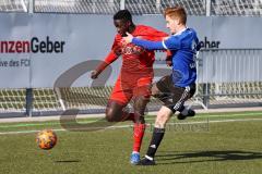 A - Junioren Bundesliga Süd/Südwest -  Saison 2021/2022 - FC Ingolstadt 04 - 1. FC Saarbrücken - Madougou Ibrahim (#9 FCI) - Dorst Henry blau Saarbrücken - Foto: Meyer Jürgen