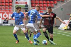 2.BL; FC Ingolstadt 04 - FC Hansa Rostock; Zweikampf Kampf um den Ball Stefan Kutschke (30, FCI) Becker Timo (2 Hansa)Bahn Bentley Baxter (8 Hansa)