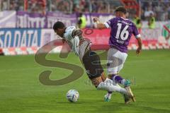3.Liga - Saison 2022/2023 - VFL Osnabrück - FC Ingolstadt 04 - Henry Rorig (Nr.16 - VFL Osnabrück) - Justin Butler (Nr.31 - FCI) - Foto: Meyer Jürgen
