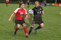 A-Klasse - Saison 2022/2023 - TSV Unsernherrn - TV 1911 Vohburg - Florian Hauber rot Vohburg - Daniel Cenzato schwarz Unsernherrn - Foto: Meyer Jürgen