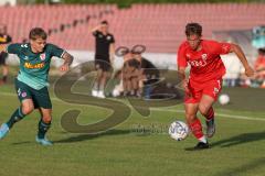 Bayernliga Nord - Saison 2023/2024 - FC Ingolstadt 04 - SSV Jahn Regensburg - Moritz Wiezorrek (Nr.15 - FCI U21) - Luis Bezjak grün Regensburg - Foto: Meyer Jürgen