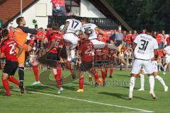 Toto Pokal - Saison 2022/2023 - SpVgg Heßdorf - FC Ingolstadt 04 - Torwart Sebastian Heinlein (Nr.1 - SpVgg Hessdorf) - Calvin Brackelmann (Nr.17 - FCI) - Nikola Stevanovic (Nr.15 - FCI) - Foto: Meyer Jürgen