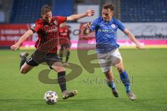 3. Liga - Hansa Rostock - FC Ingolstadt 04 - Michael Heinloth (17, FCI) Lukas Scherff (20 Rostock)