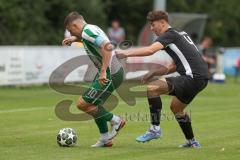 Landesliga - Saison 2025/26 - SV Manching - FC Memmingen II - Sebastian Graßl (Nr.10 - SV Manching) - Mayer Felix schwarz Memmingen  - Foto: Meyer Jürgen