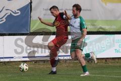 Freundschaftsspiel- Saison 2025/26- SV Kasing - FC Geisenfeld-  - Michael Spenger grün Geisenfeld - Patrick Rzepka rot Kasing - Foto: Meyer Jürgen