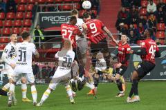 3.Liga - Saison 2022/2023 - FC Ingolstadt 04 -  Dynamo Dresden - Patrick Schmidt (Nr.9 - FCI) beim Kopfball - Moussa Doumbouya (Nr.27 - FCI) - - Foto: Meyer Jürgen