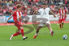 3. Liga - Saison 2023/24 - Rot-Weiss Essen - FC Ingolstadt 04 -  - Felix Götze (#24 Essen) - Draculic Ognjen (Nr.30 - FCI) - Foto: Meyer Jürgen