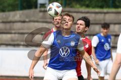 Kreisklasse -  Saison 2023/2024 - DJK Ingolstadt - FC Tegernbach - Frederik Straßer blau DJK Ingolstadt - Denil Pepa rot Tegernbach - Foto: Meyer Jürgen