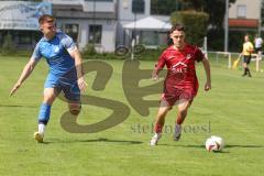 Kreisliga - Saison 2025/26- SV Hundszell - SV Zuchering - Christoph Handl blau Hundszell -  - Leander Friedl rot Zuchering - Foto: Meyer Jürgen