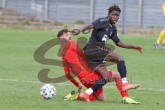 Bayernliga Süd - Saison 2021/2022 - FC Ingolstadt 04 II - TürkAugsburg - Pintidis Georgios (#6 FCI) rot - Mayande Sall schwarz Augsburg - Foto: Meyer Jürgen