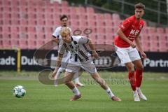 Bayernliga Nord - Saison 2026/27 - FC Ingolstadt 04 II - ASV Cham - Patrick Bachmann (Nr.11 - FCI II) - Alexander Sigl rot Cham - Foto: Meyer Jürgen