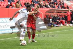 3. Liga; FC Ingolstadt 04 - 1. FC Saarbrücken; Zweikampf Kampf um den Ball Yannick Deichmann (20, FCI) Kamara Abdoulaye (15 FCS)